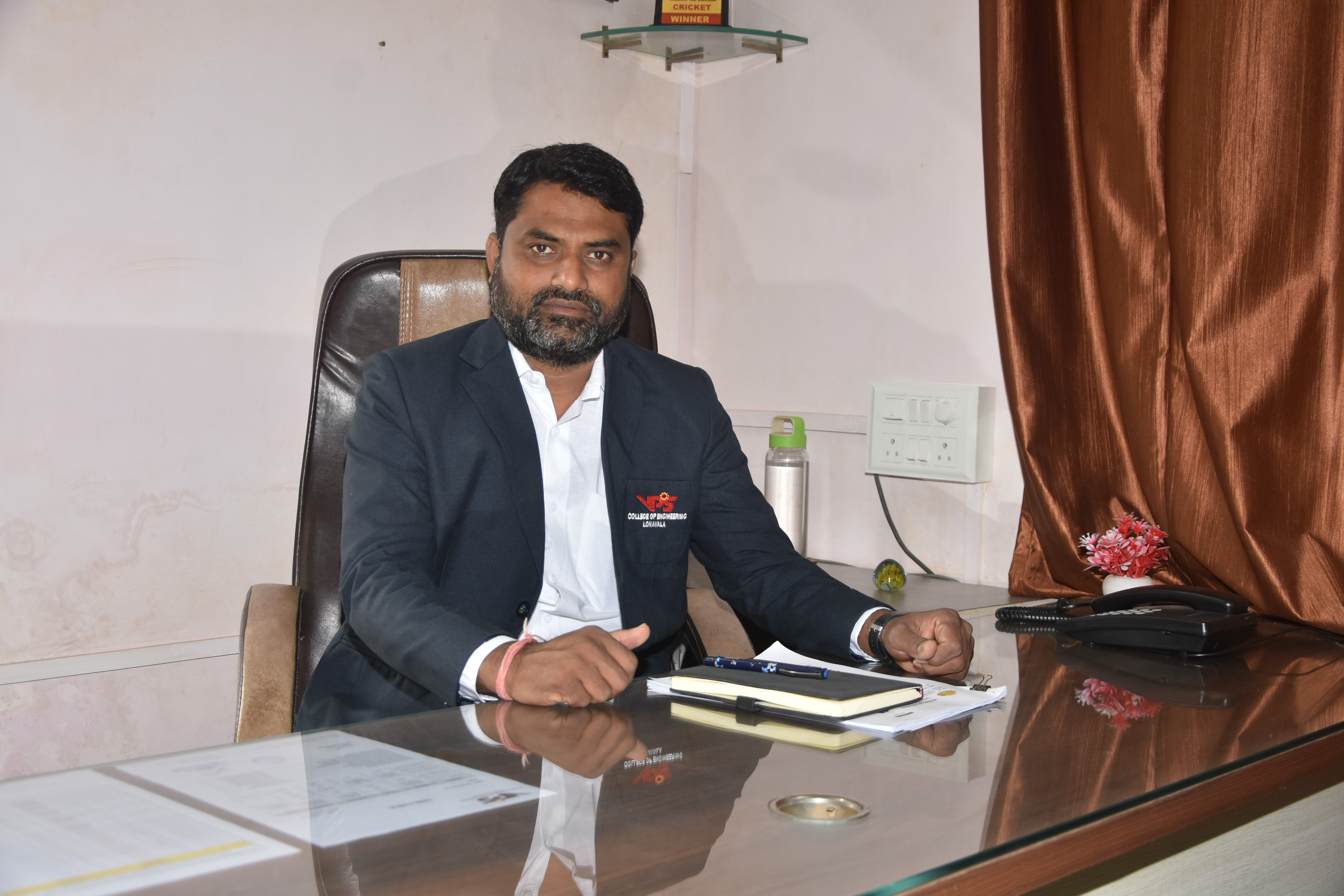 Dr. Harish Harsurkar